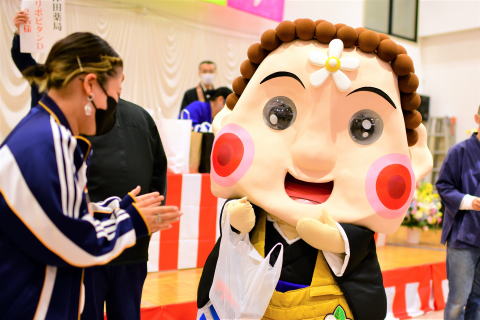 ���I�҂Ɍi�i���^